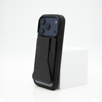 Black Peel Magnetic Wallet Stand attached flat to the back of an iPhone, shown from the rear